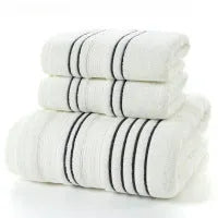 Pure cotton bath towel set with one large towel and two hand towels in neutral colours.
