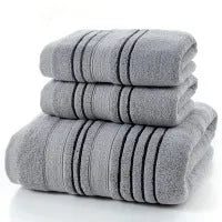 Pure cotton bath towel set with one large towel and two hand towels in neutral colours.