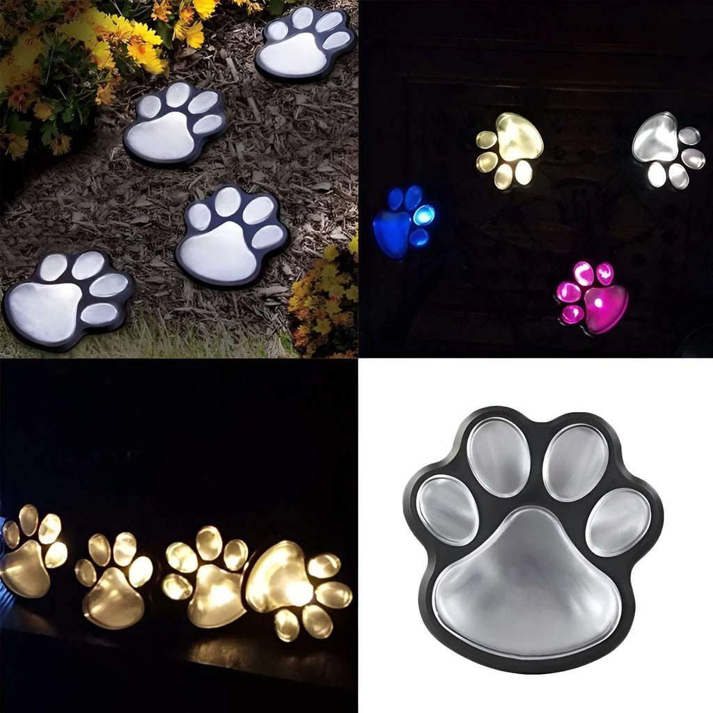 Four black paw print solar garden lights connected to central solar panel pole