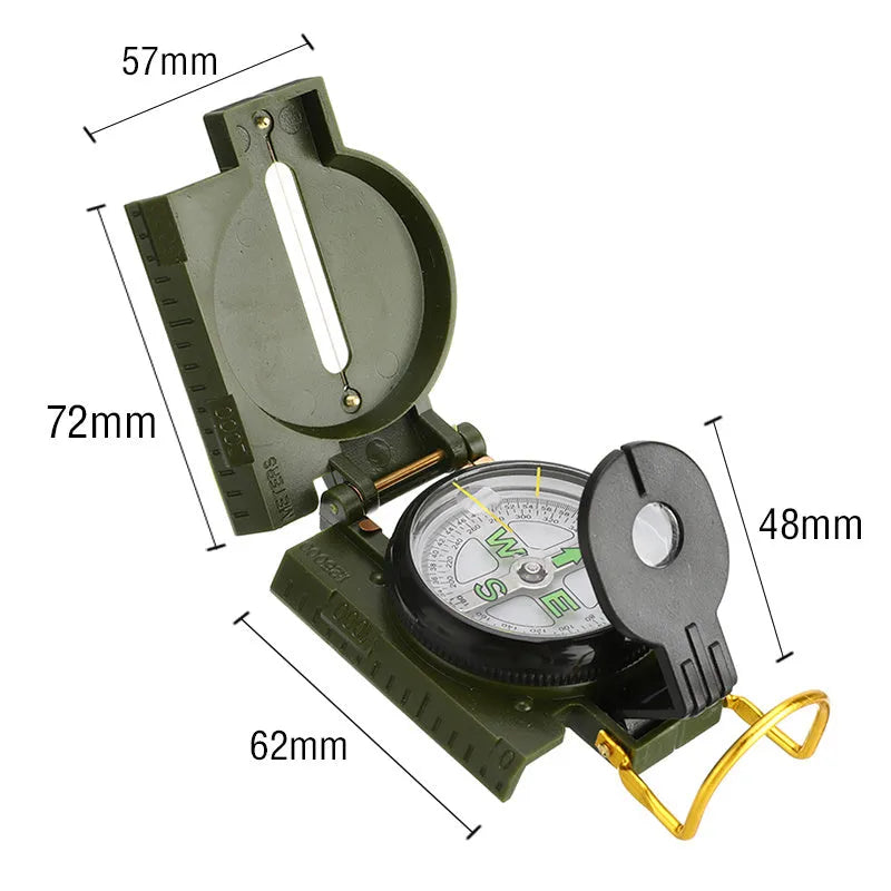 Army yellow outdoor camping compass with carabiner clip on a metal background