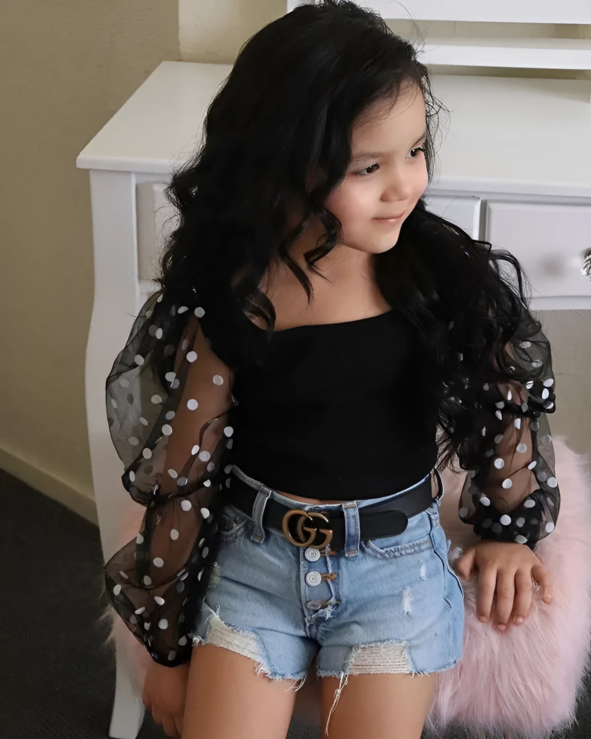Children's cotton striped top with dot mesh sleeves and ripped denim shorts suit in black on a child