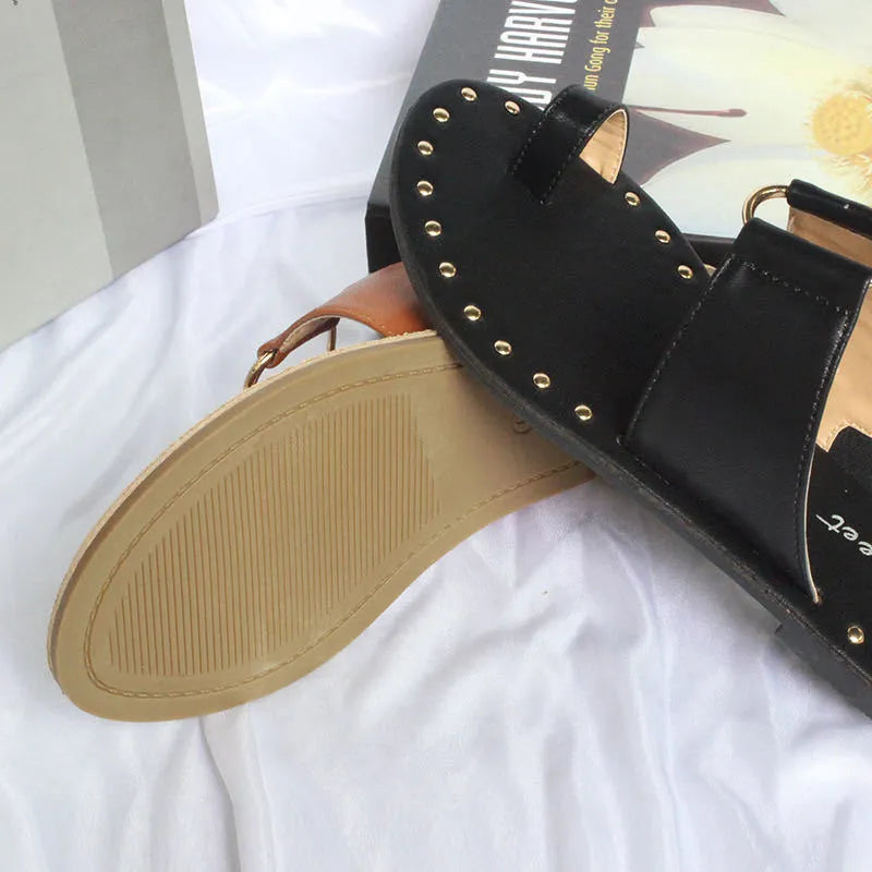 Women's flat sandals with rivet detailing, artificial PU upper, black and brown, sizes 36-43