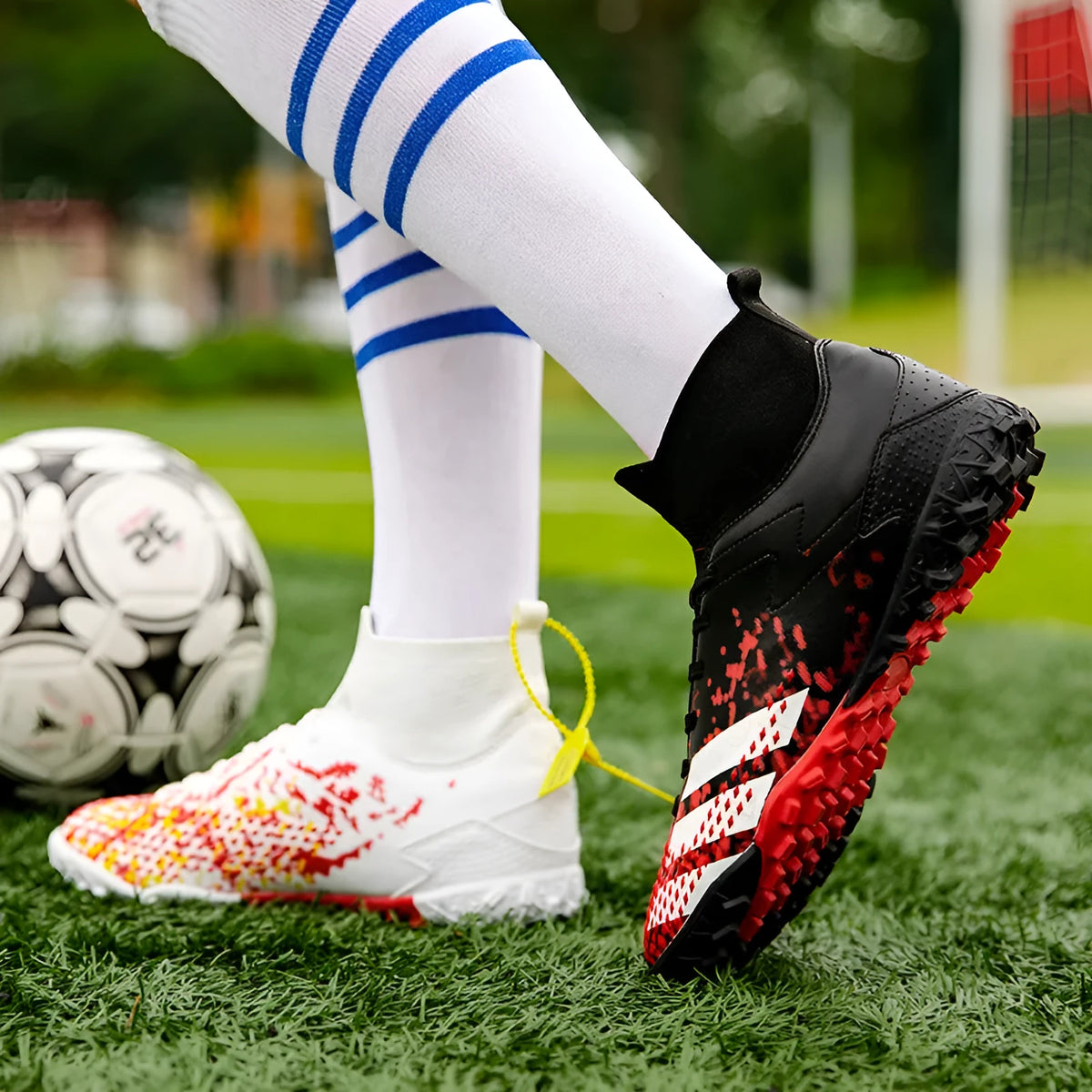 Black high-top student training football shoes with PU upper and long nails on grass