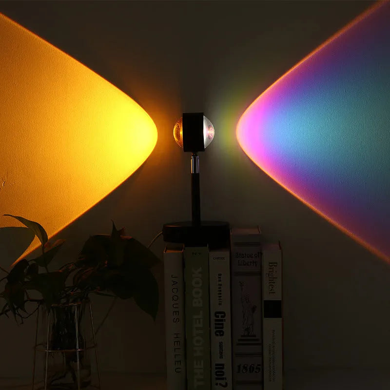 Black USB dual-head sunset rainbow projection lamp with touch control on a table.