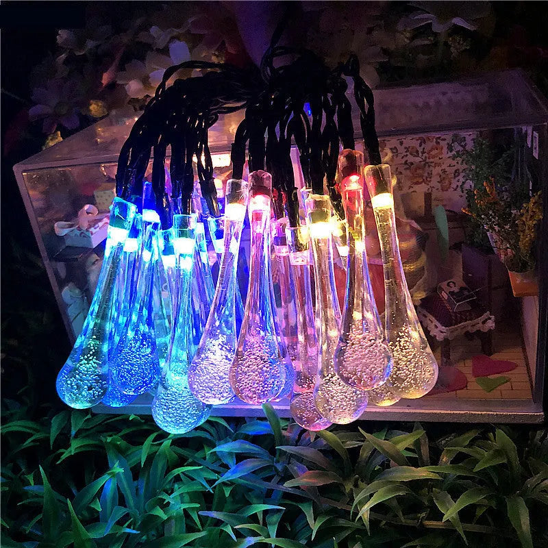 Solar-powered LED outdoor string lights with water drop-shaped pendants on a 6.5m cable