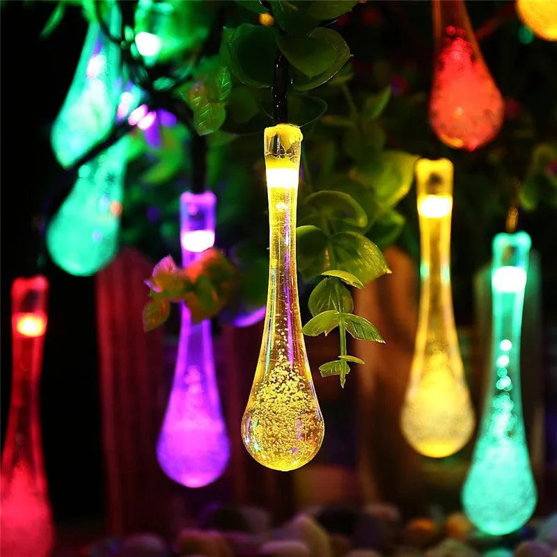Solar-powered LED outdoor string lights with water drop-shaped pendants on a 6.5m cable
