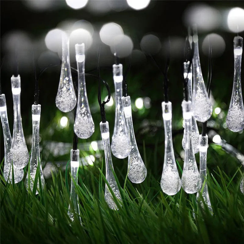 Solar-powered LED outdoor string lights with water drop-shaped pendants on a 6.5m cable