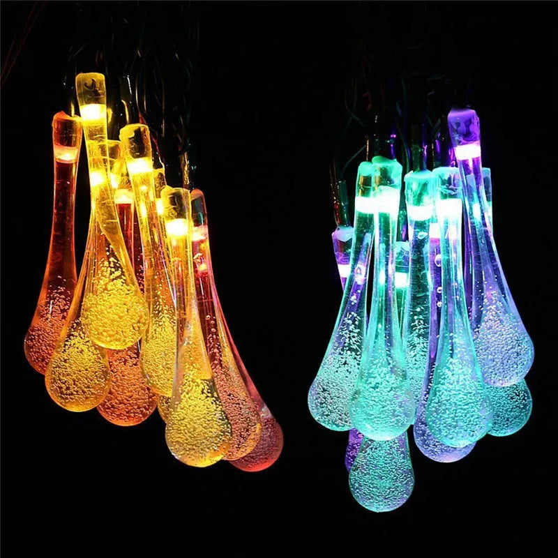 Solar-powered LED outdoor string lights with water drop-shaped pendants on a 6.5m cable