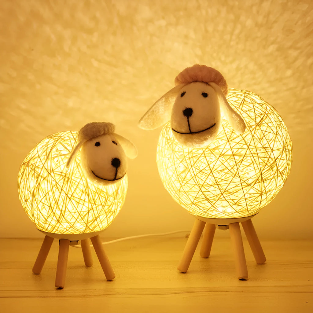Hand-woven beige lamb night light with starry sky projection on a bedside table
