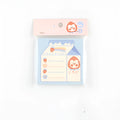 Minky's Kawaii square memo notepad in a strawberry pattern, showing its 80x80mm size and paper brick shape.