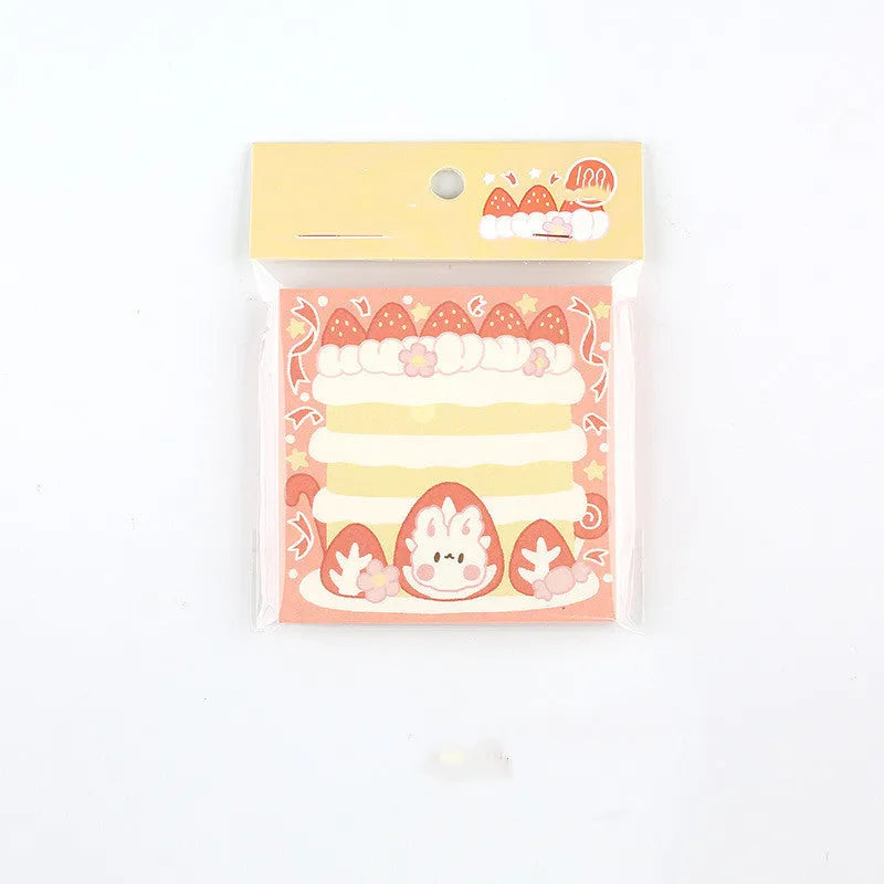 Minky's Kawaii square memo notepad in a strawberry pattern, showing its 80x80mm size and paper brick shape.