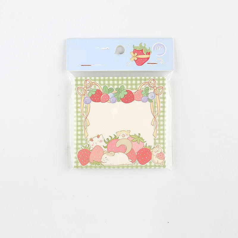 Minky's Kawaii square memo notepad in a strawberry pattern, showing its 80x80mm size and paper brick shape.