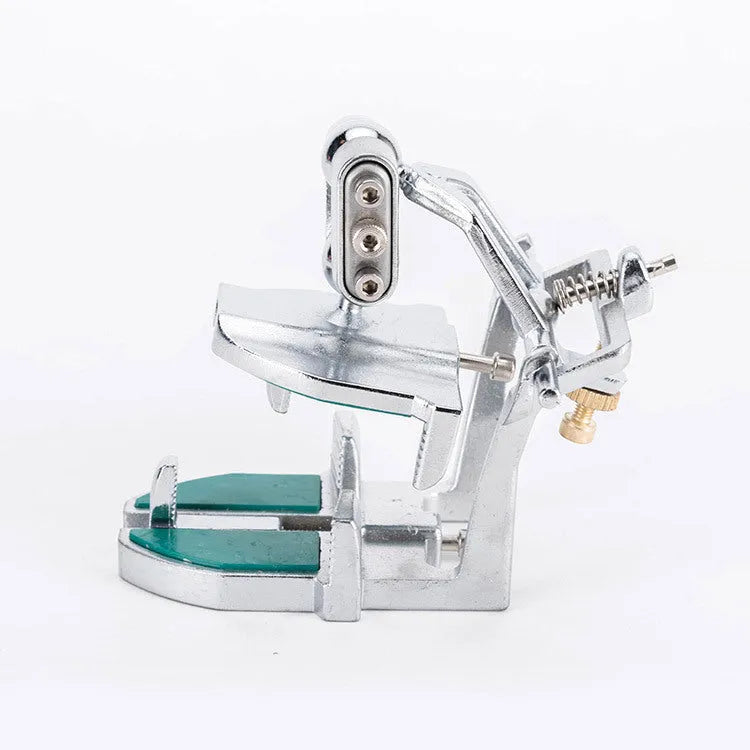 Korean dental articulator showing adjustable top and base components with incisal pin.