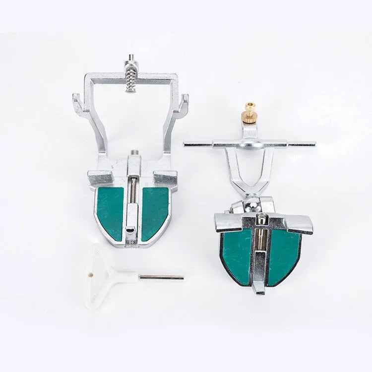 Korean dental articulator showing adjustable top and base components with incisal pin.