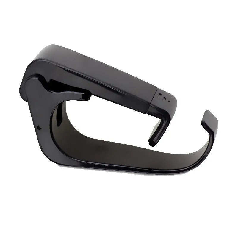 Black ring bracket mobile phone holder attached to a wireless Bluetooth handle for desktop use