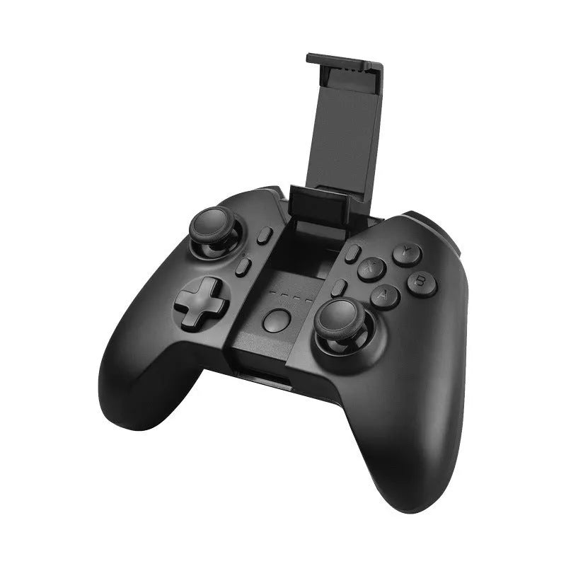 Black ring bracket mobile phone holder attached to a wireless Bluetooth handle for desktop use