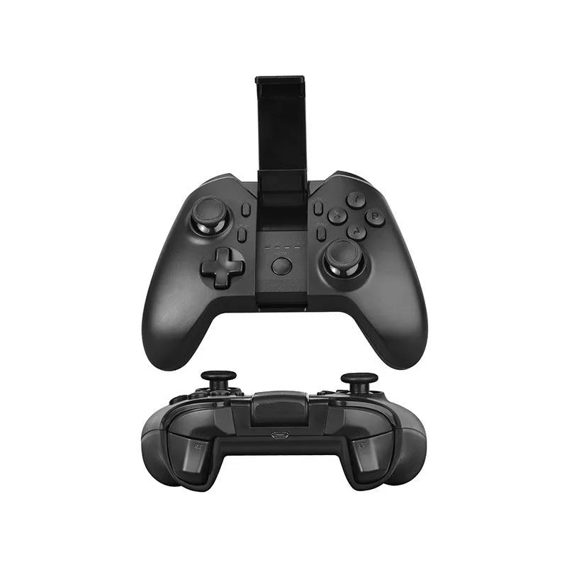 Black ring bracket mobile phone holder attached to a wireless Bluetooth handle for desktop use