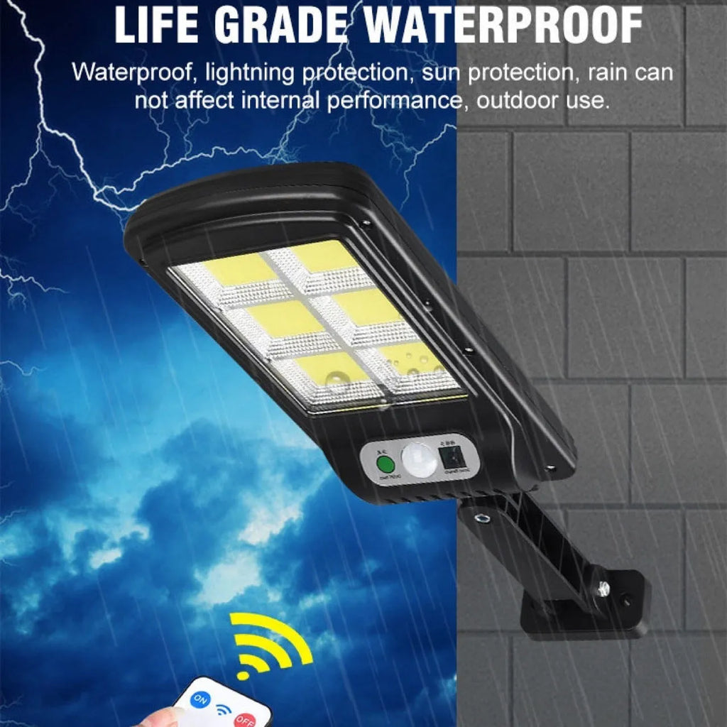 IP67 waterproof solar wall light with high-brightness 120COB LED, black plastic housing, mounted on an outdoor wall