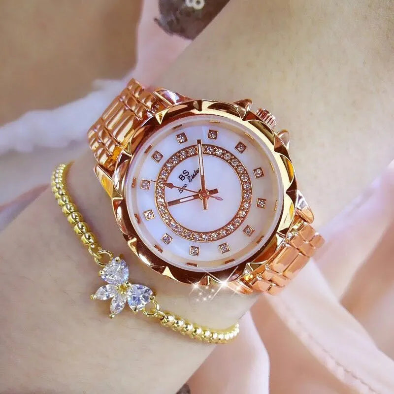 Women's diamond-set quartz wristwatch round alloy case 32mm gold finish mineral glass