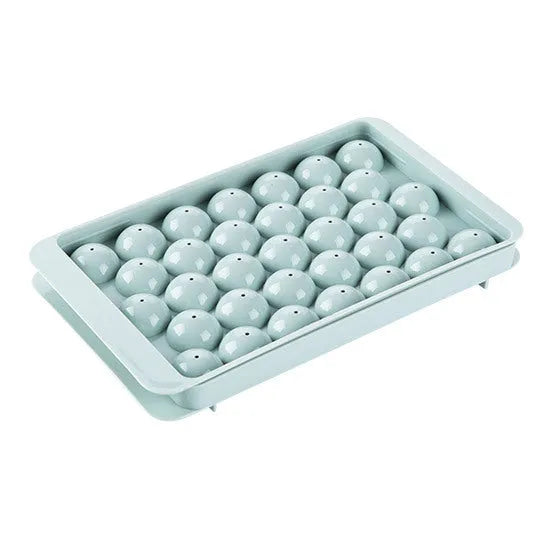 Sky blue or pink plastic ice cube tray making round ball ice for drinks.