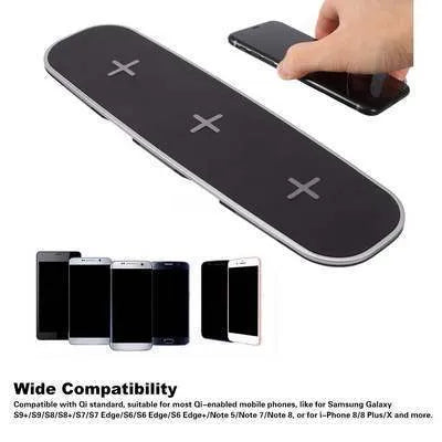Black and white 3-in-1 Qi wireless charging pad station on a wooden desk.