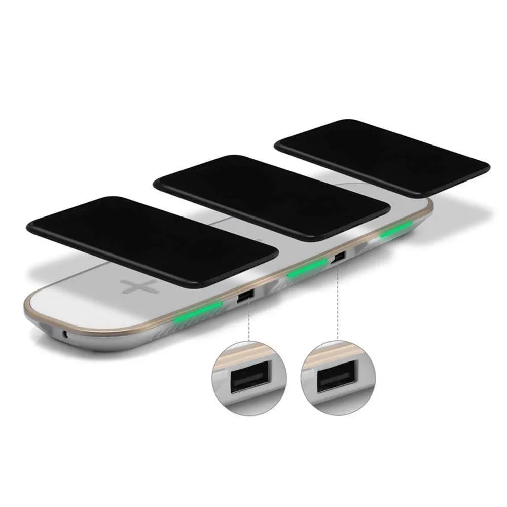 Black and white 3-in-1 Qi wireless charging pad station on a wooden desk.