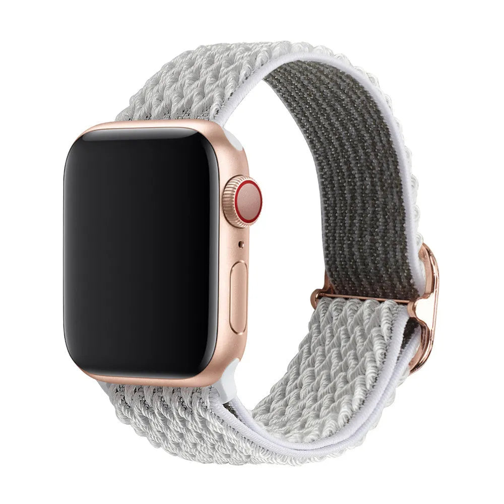 Braided nylon elastic strap for Apple Watch in various colours on a grey background.