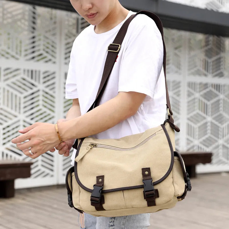 Men's canvas shoulder bag in khaki with cover-type opening and single strap, medium size
