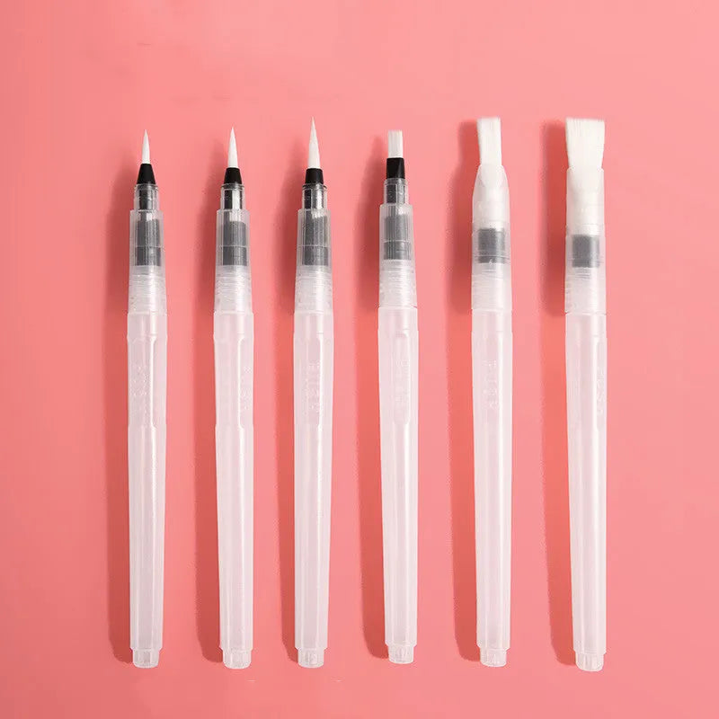 Solid watercolour paint set in a fan-shaped foldable palette inside a transparent plastic box with fountain pen and sponge.