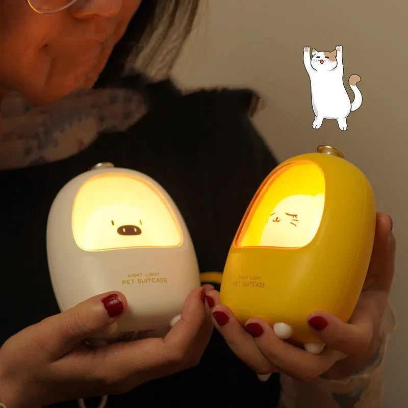Cartoon character night light on bedside table with USB charging cable