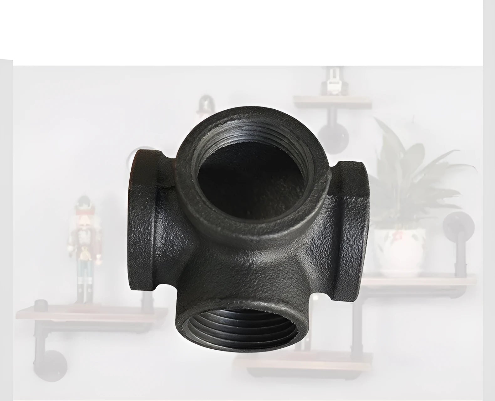 Galvanised steel four-way pipe fittings in three diameter sizes with malleable iron construction