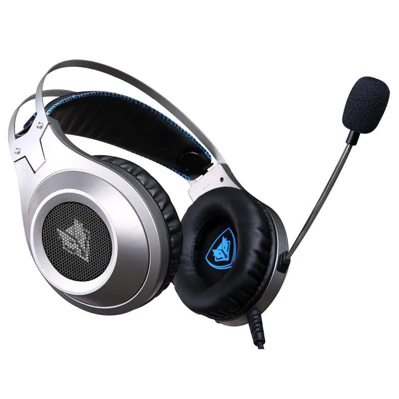 Black wired USB over-ear computer headset with microphone on a desktop.
