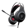 Black wired USB over-ear computer headset with microphone on a desktop.