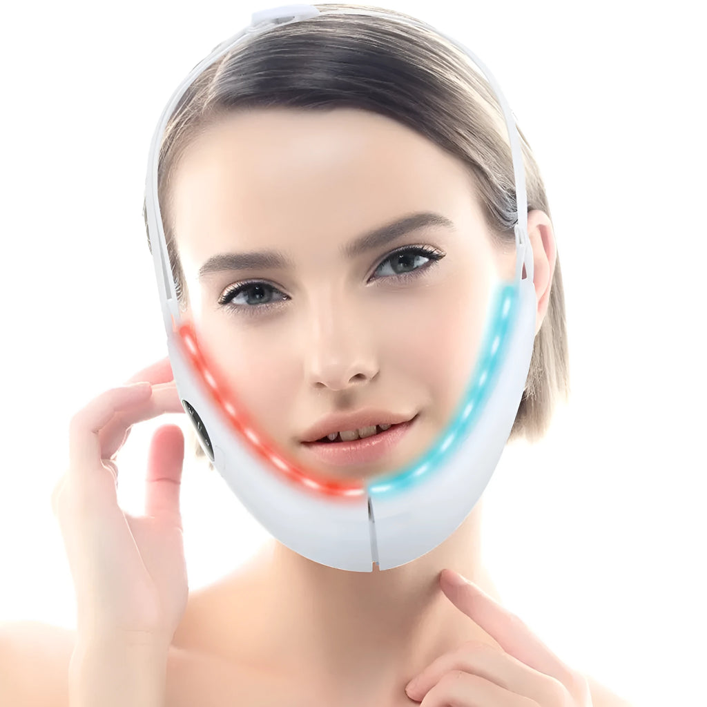 White multifunctional facial lifting instrument with red and blue light therapy and vibration modes on a flat surface