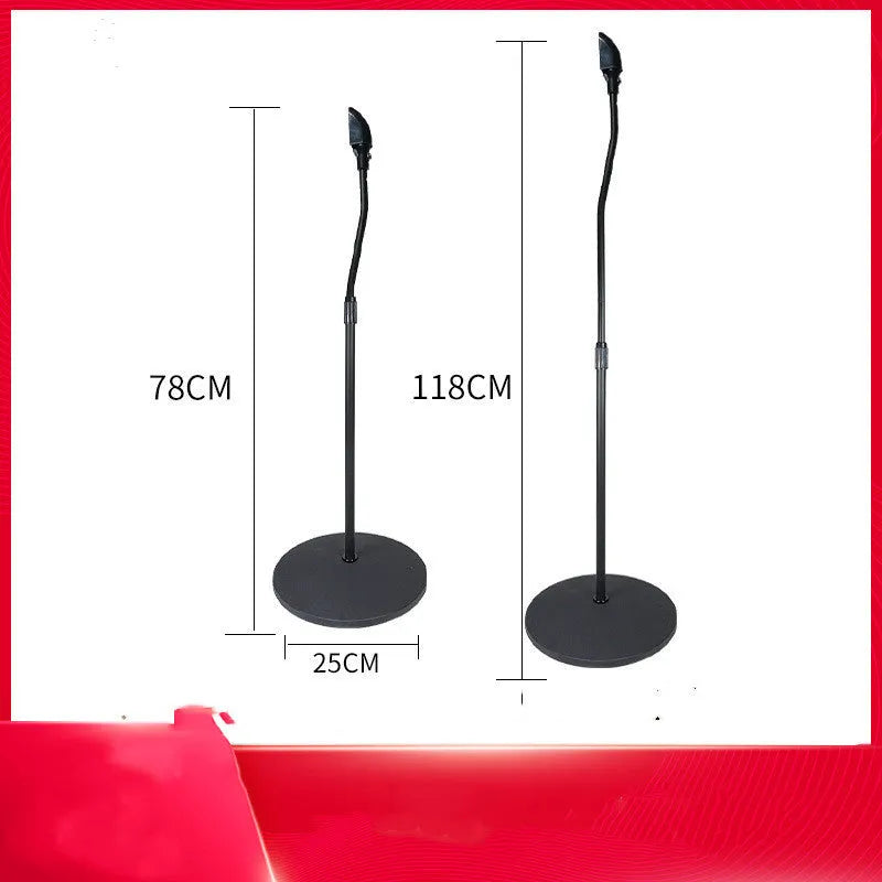 A pair of black tripod stands holding bookshelf speakers for a surround sound system.
