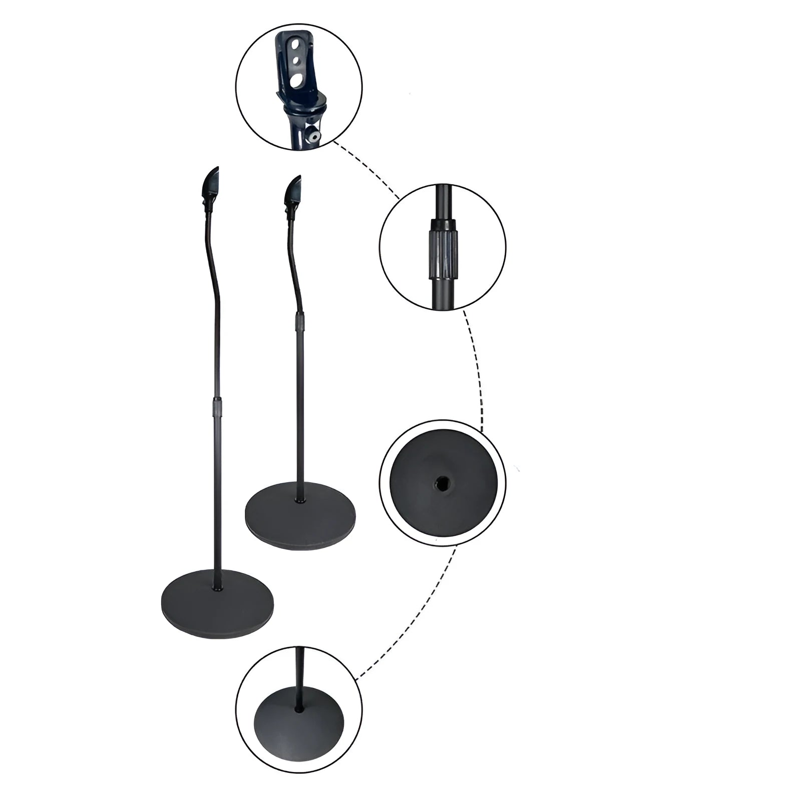 A pair of black tripod stands holding bookshelf speakers for a surround sound system.