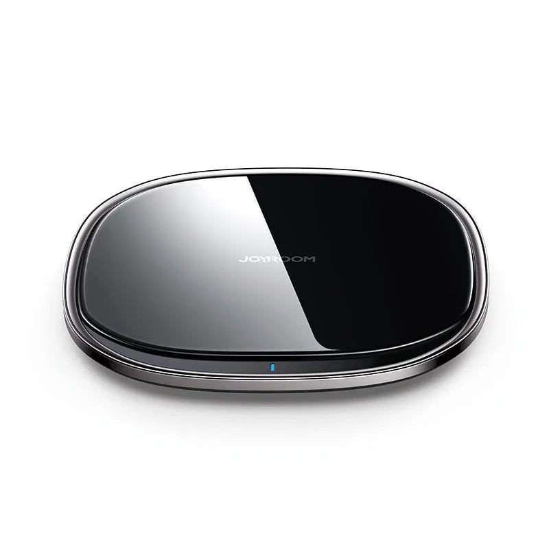 Black or white 15W wireless phone charger with zinc alloy and glass build on a desk