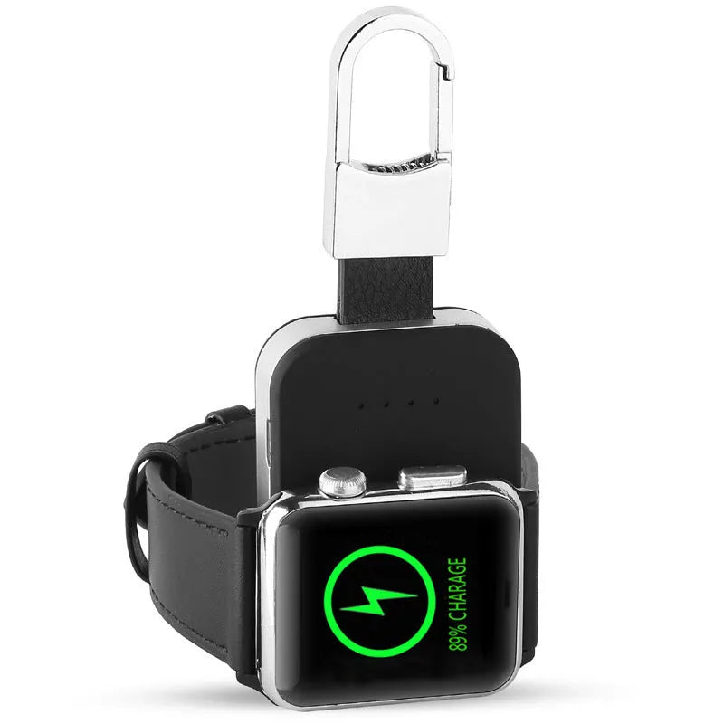 Black Apple Watch wireless keychain power bank on a keyring showing its compact size.