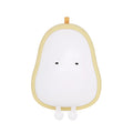 Yali pear-shaped silicone night light with warm yellow illumination on bedside table