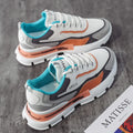 Women's white mesh lace-up casual sneakers with mid heel, side view