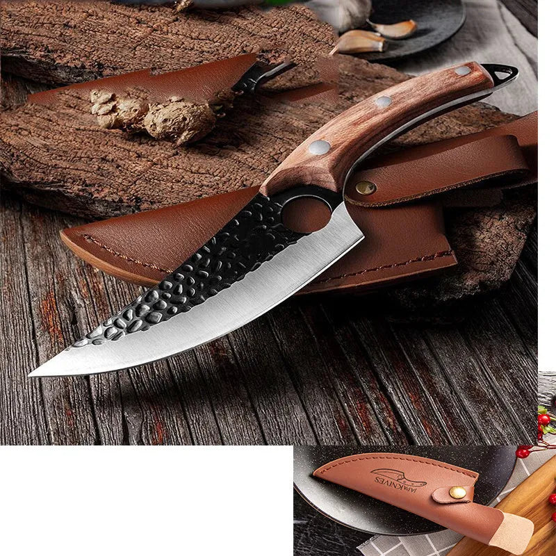 Curved boning butcher knife with hammer-pattern blade and brown leather sheath on a cutting board.