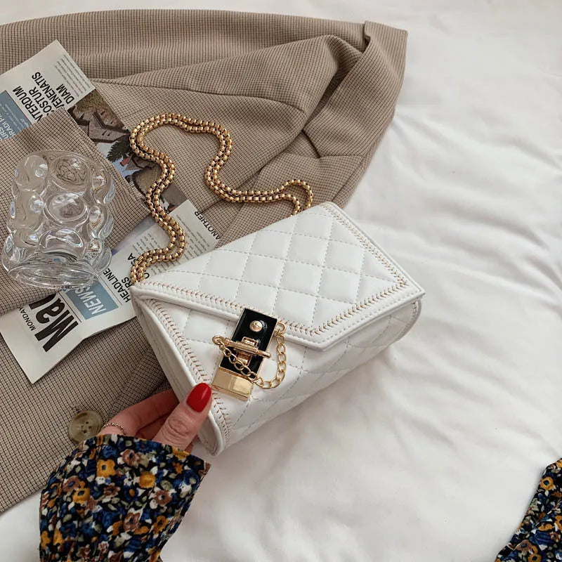 Lingge chain messenger fashion small square bag in black with rhombus pattern, lock closure, and chain handle