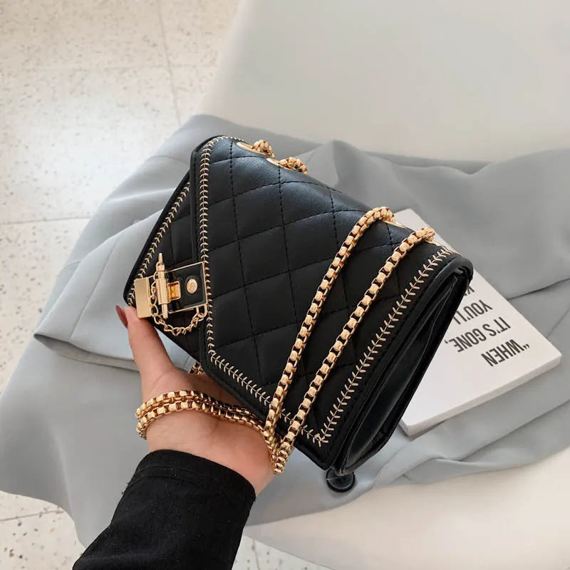 Lingge chain messenger fashion small square bag in black with rhombus pattern, lock closure, and chain handle