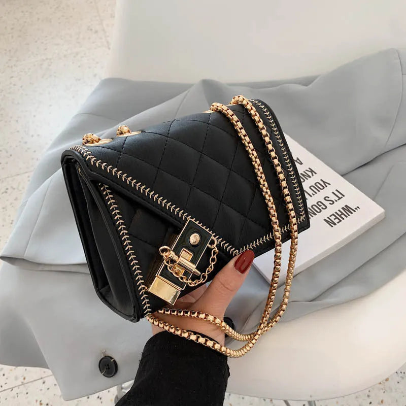 Lingge chain messenger fashion small square bag in black with rhombus pattern, lock closure, and chain handle