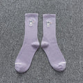 Embroidered astronaut cotton socks for unisex winter wear, medium thickness in black