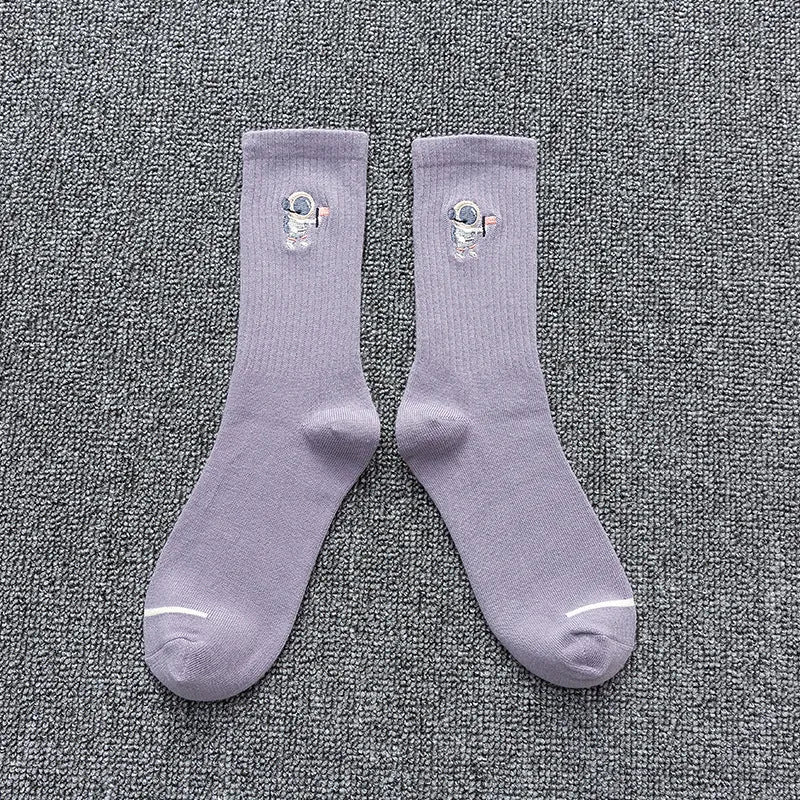 Embroidered astronaut cotton socks for unisex winter wear, medium thickness in black