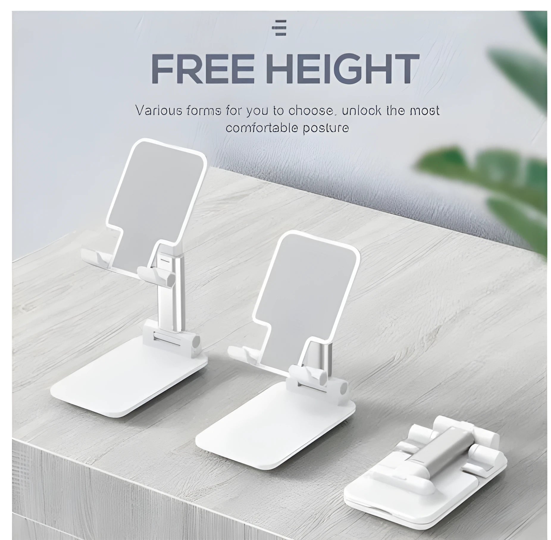 Black silicone and ABS plastic desk mobile phone holder on a wooden table.