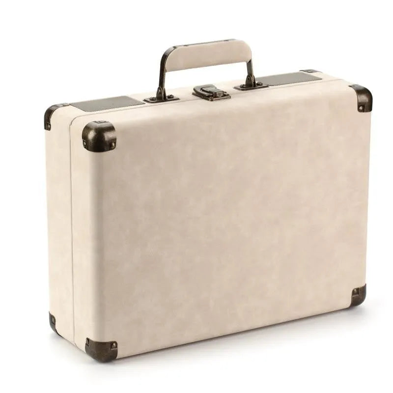 Leather-cased portable Bluetooth turntable for vinyl and film records in multiple colours.