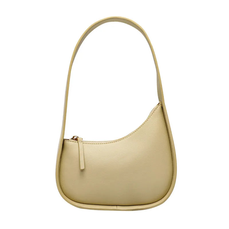 Genuine leather ladies shoulder bag with half moon design and wide strap