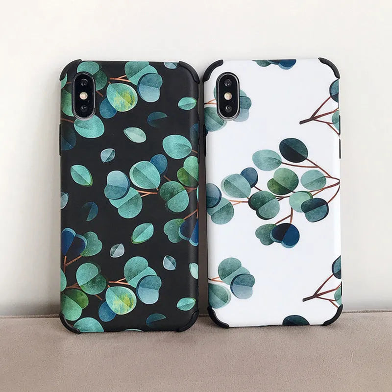 Black silicone iPhone case with leaf pattern texture and raised camera protection rim